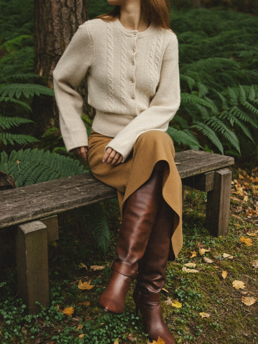 Cable cardigan, camel skirt