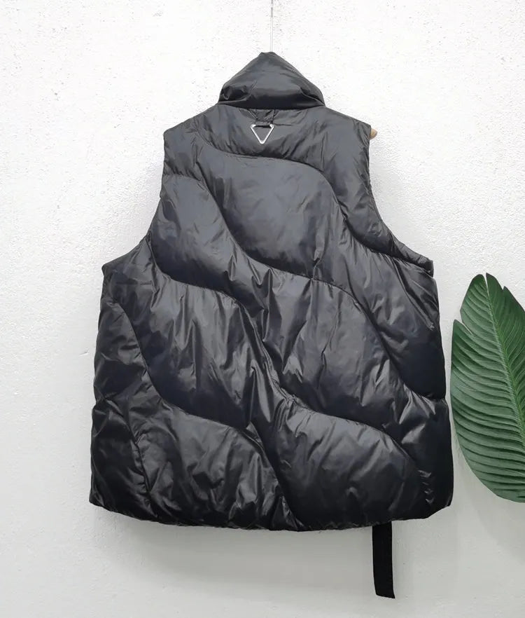 Women's Oversized Padded Puffer Gilet with High Shawl Collar and Adjustable Hem – Warm Sleeveless Winter Bodywarmer with Relaxed Fit for Casual Streetwear and Autumn Winter Layering
