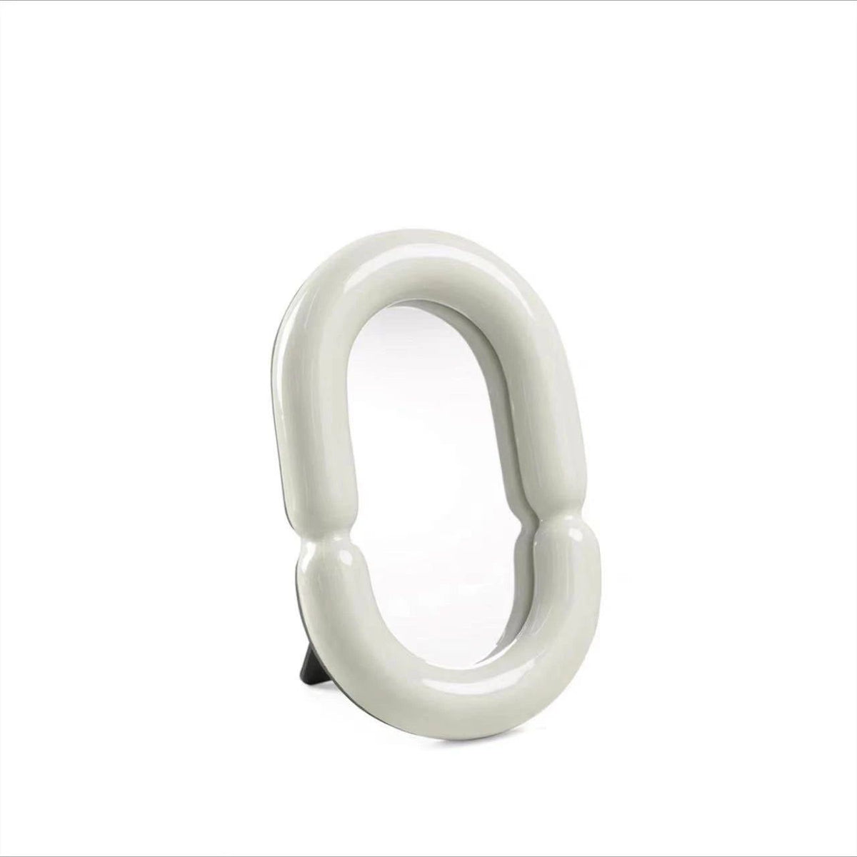 Elegant Oval Mirror with Sculptural Shape