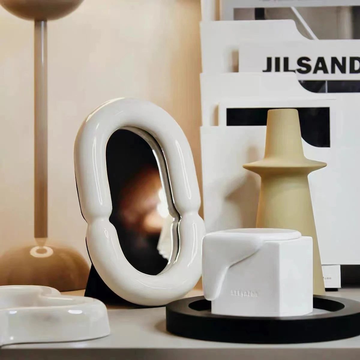 Elegant Oval Mirror with Sculptural Shape