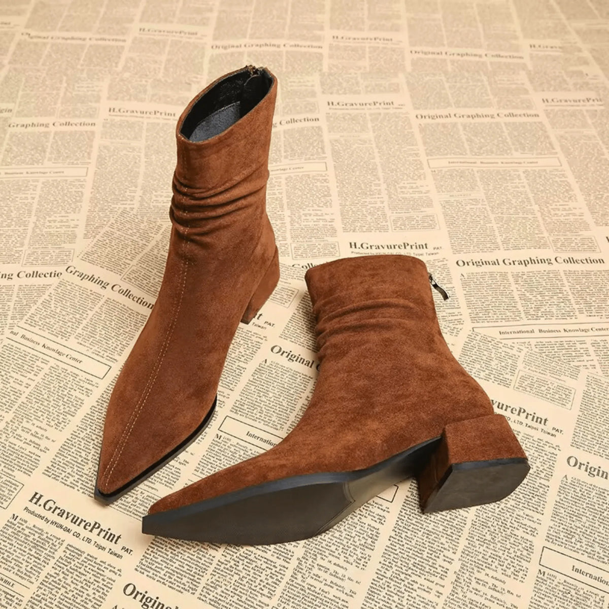 Women's suede side zip ankle boots with pointed toe and ruched shaft