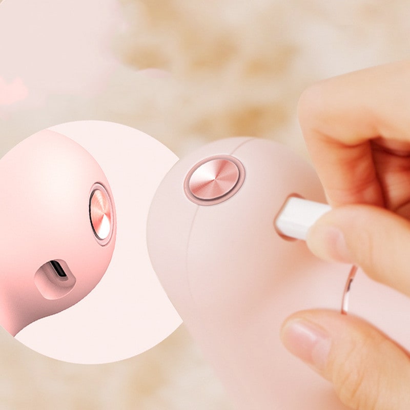 Mini Handheld Deep Tissue Massage Gun with Four Interchangeable Heads and Rechargeable Battery