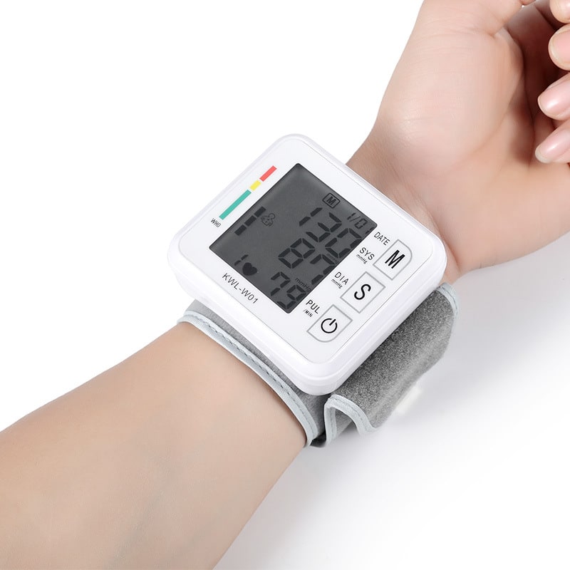 Home Wristband Automatic Blood Pressure Monitor with Portable Lcd Display and Adjustable Strap