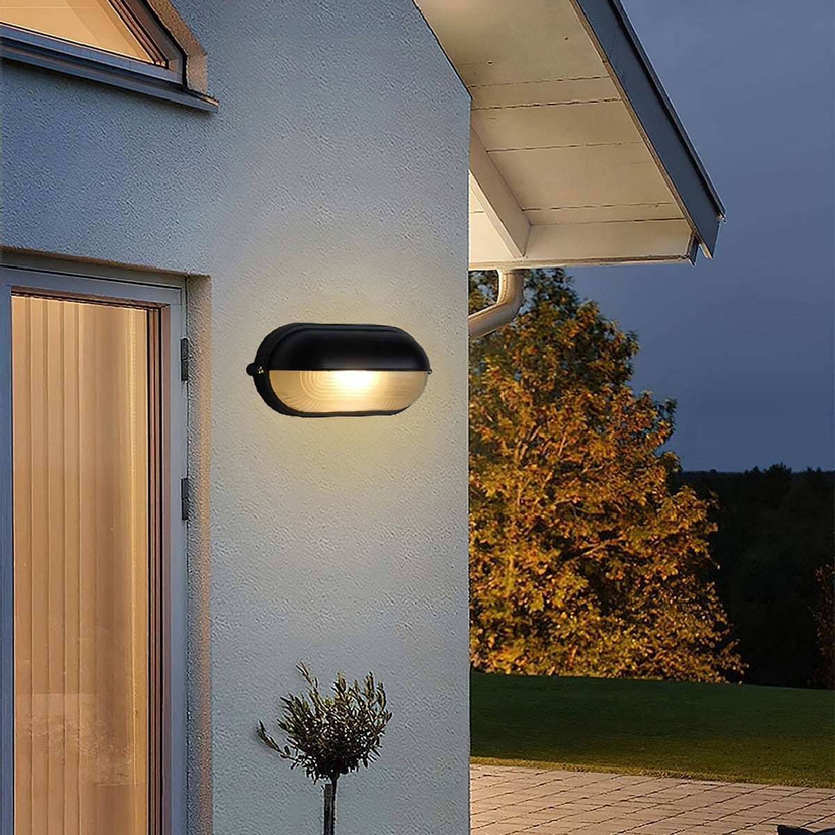 Outdoor Bulkhead Wall Light with Oval Shield and Ribbed Glass Diffuser