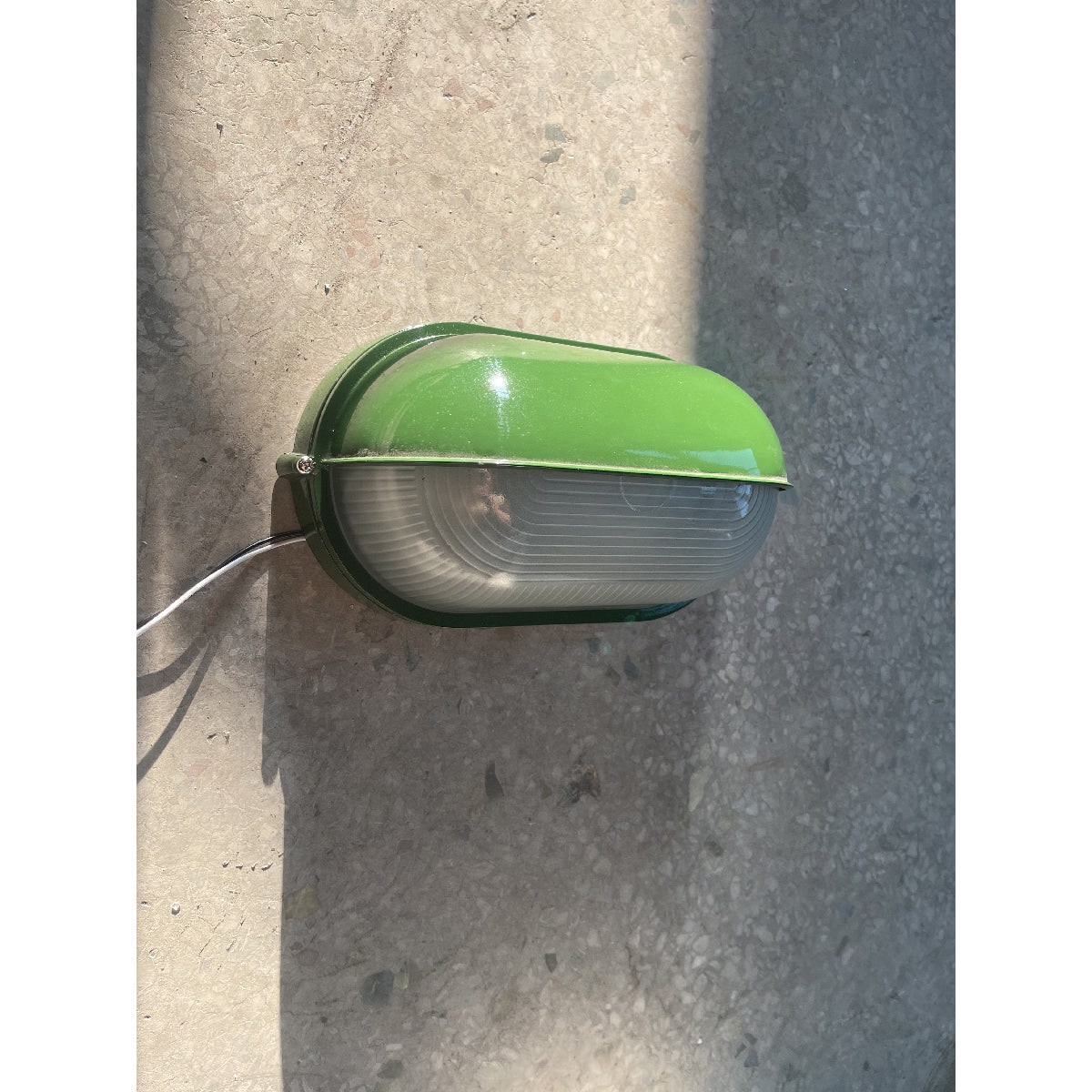 Outdoor Bulkhead Wall Light with Oval Shield and Ribbed Glass Diffuser
