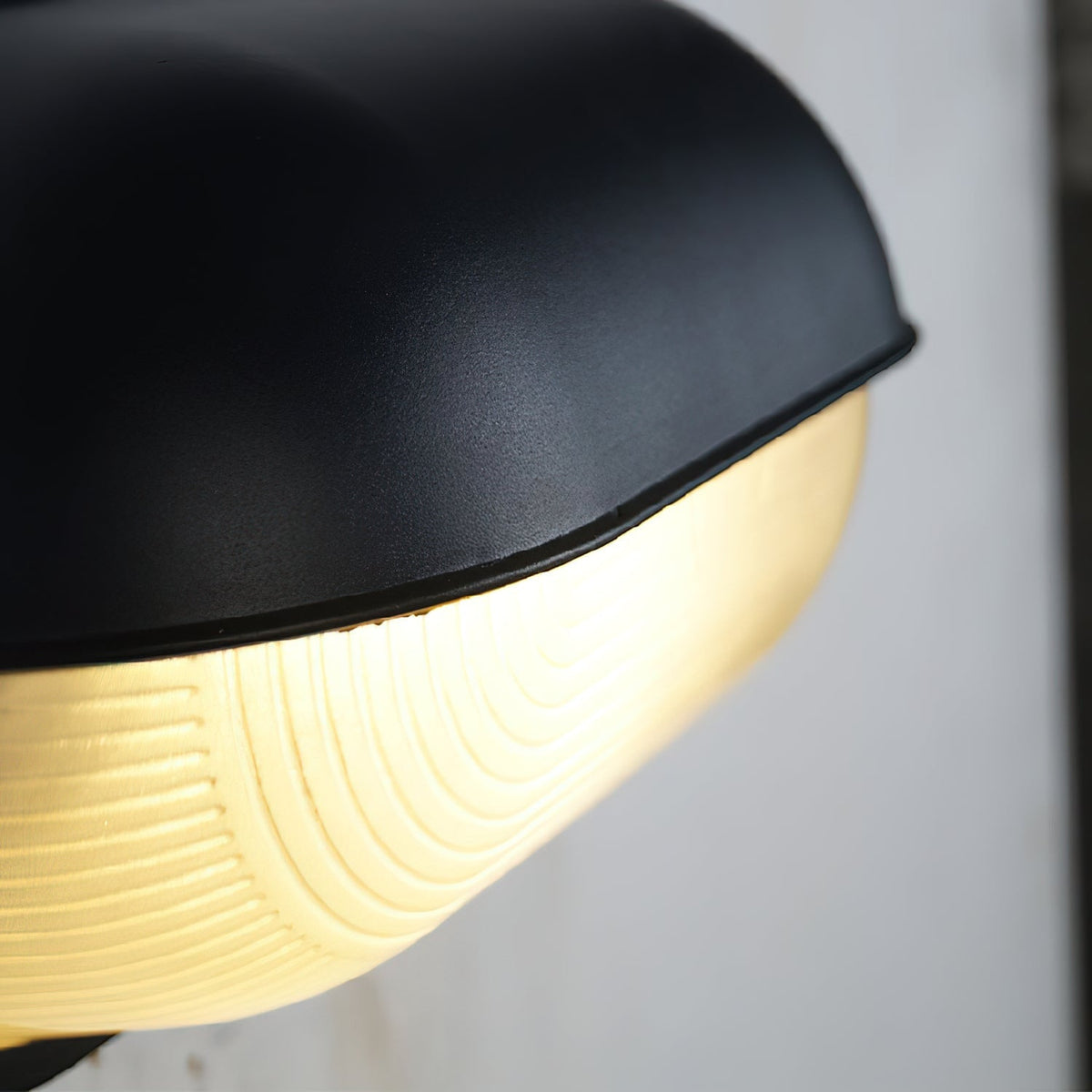 Outdoor Bulkhead Wall Light with Oval Shield and Ribbed Glass Diffuser