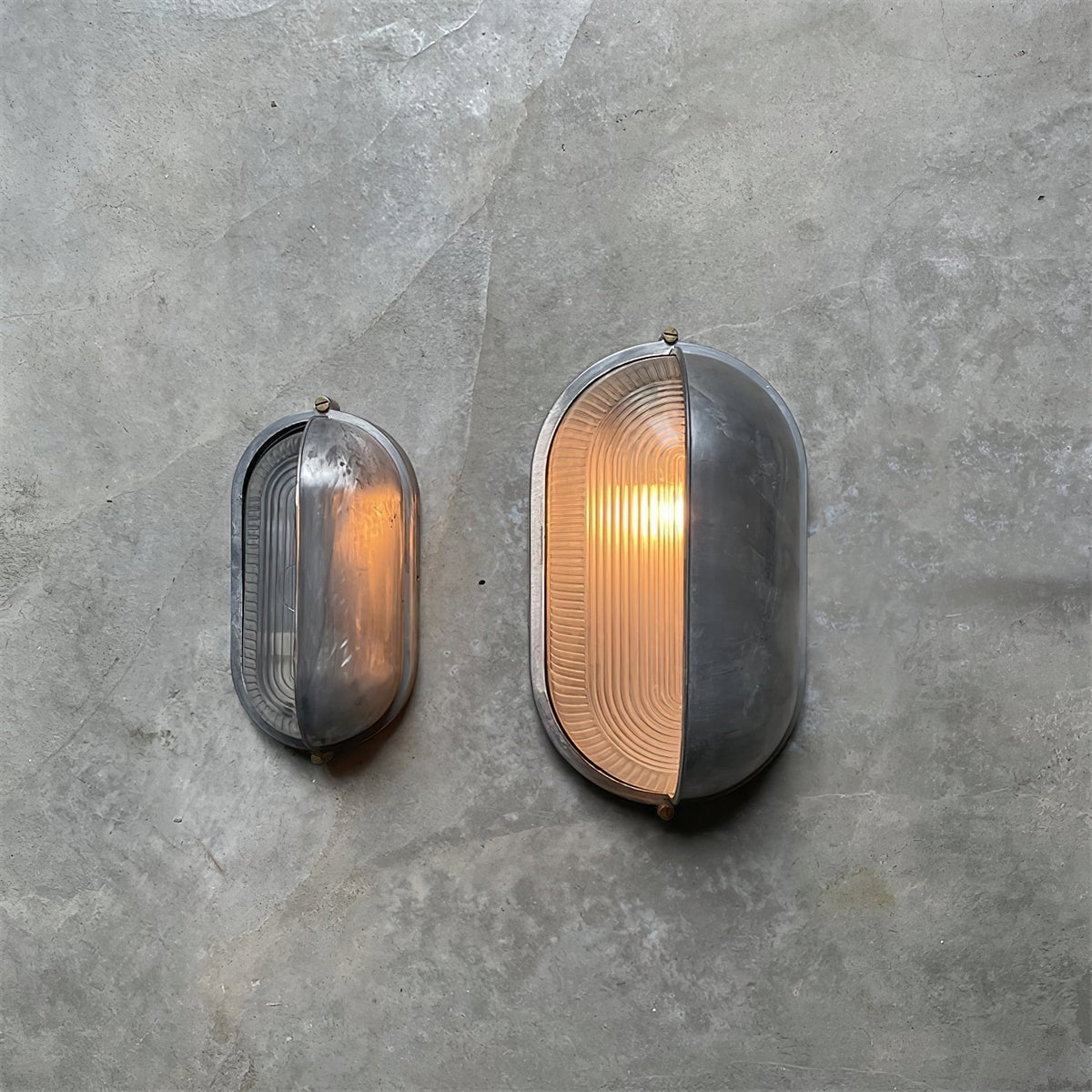 Outdoor Bulkhead Wall Light with Oval Shield and Ribbed Glass Diffuser