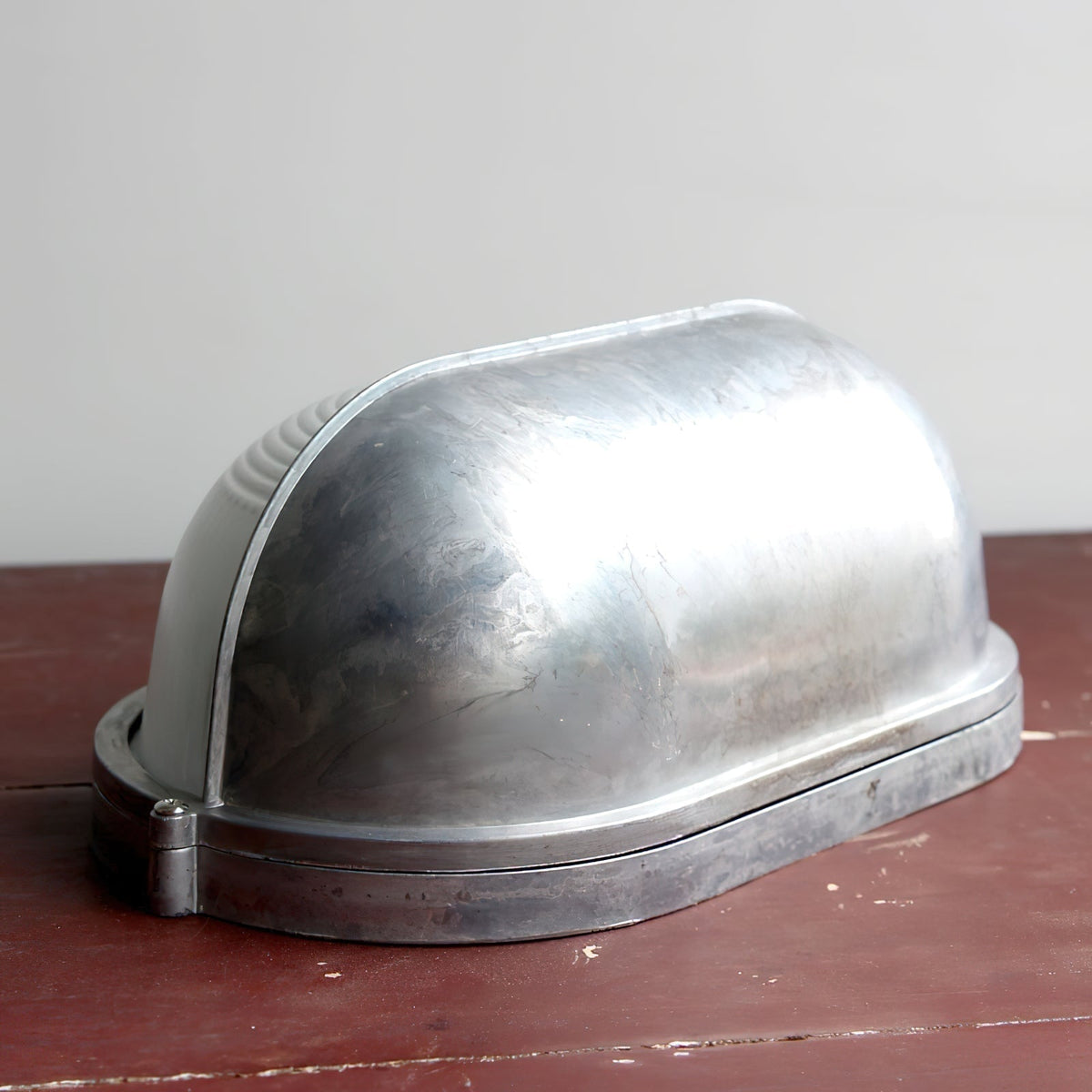 Outdoor Bulkhead Wall Light with Oval Shield and Ribbed Glass Diffuser