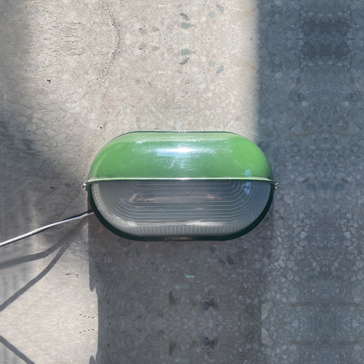 Outdoor Bulkhead Wall Light with Oval Shield and Ribbed Glass Diffuser