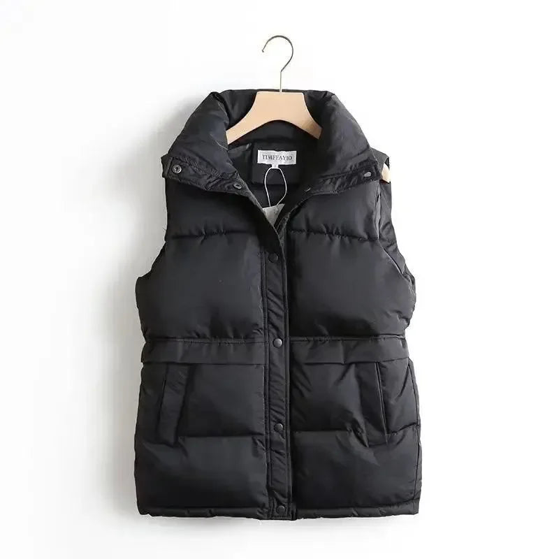 Women's Padded Puffer Gilet with High Stand Collar and Snap Button Fastening – Warm Sleeveless Quilted Bodywarmer with Flap Pockets for Comfortable Casual Autumn Winter Layering and Everyday Outdoor Wear