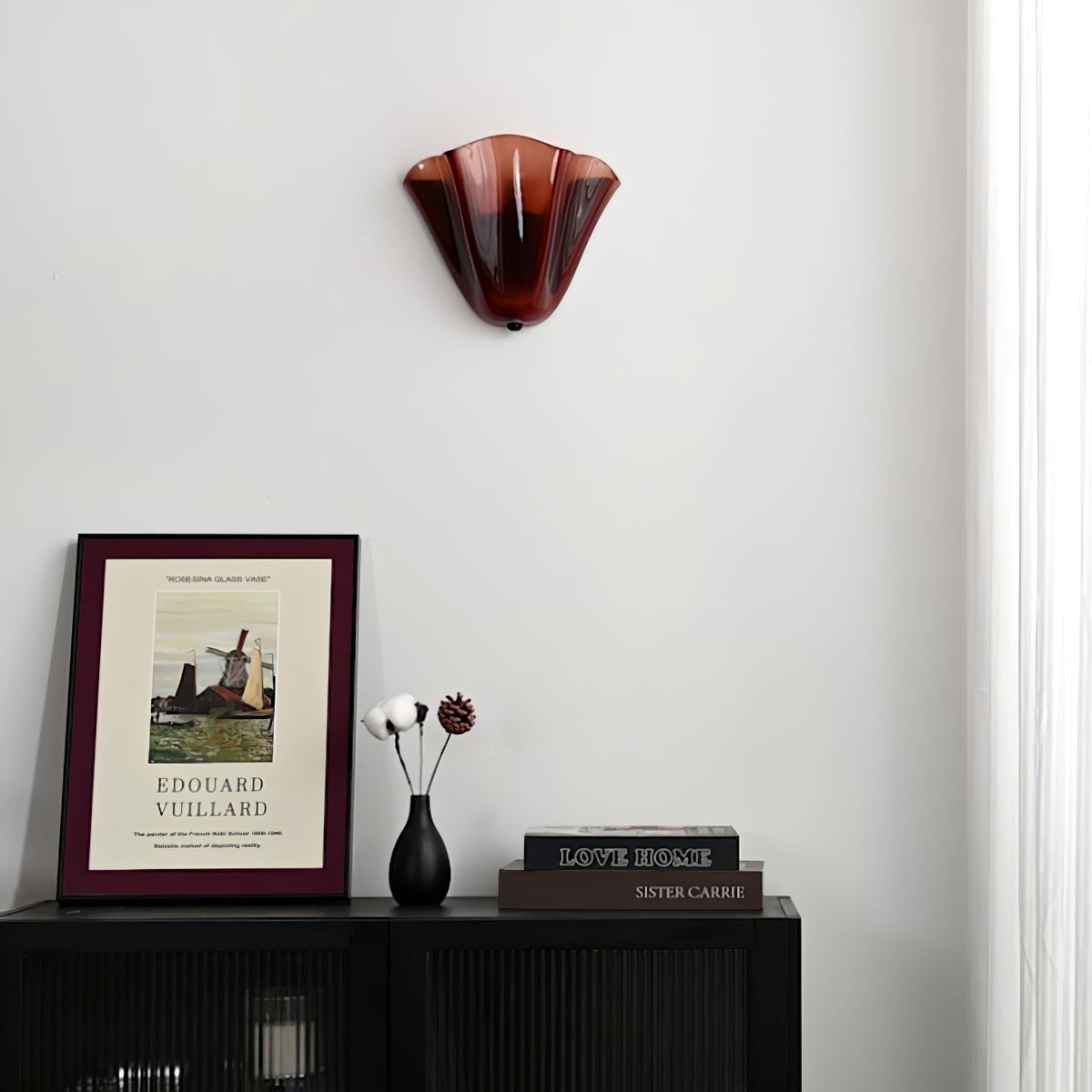 Wall Sconce with Wavy Glass Shade and Warm Ambient Lighting