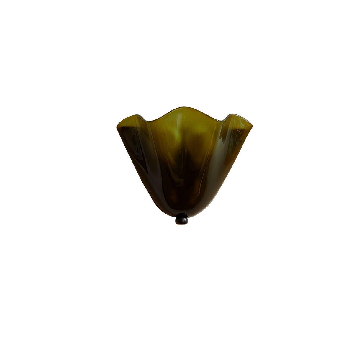 Wall Sconce with Wavy Glass Shade and Warm Ambient Lighting