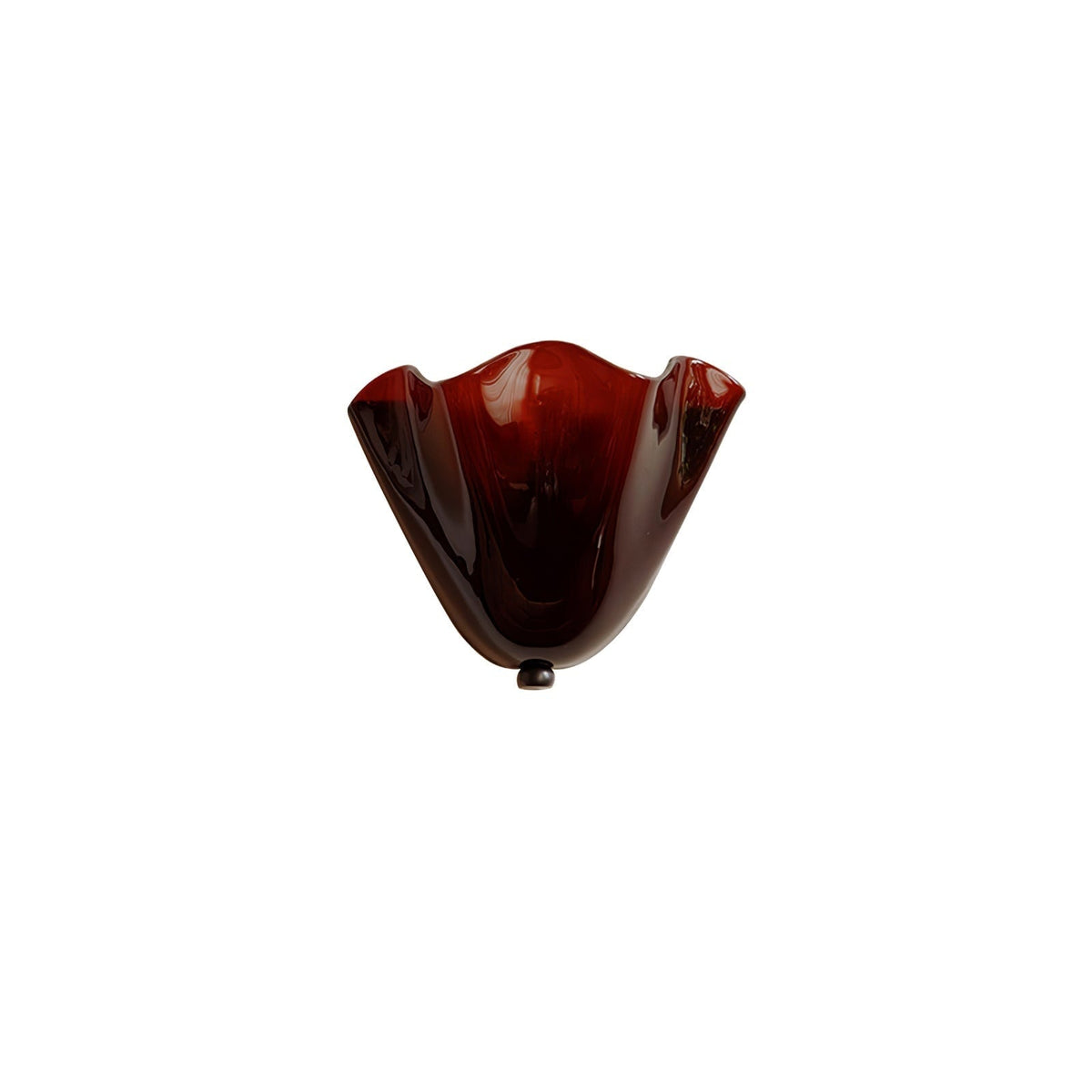 Wall Sconce with Wavy Glass Shade and Warm Ambient Lighting
