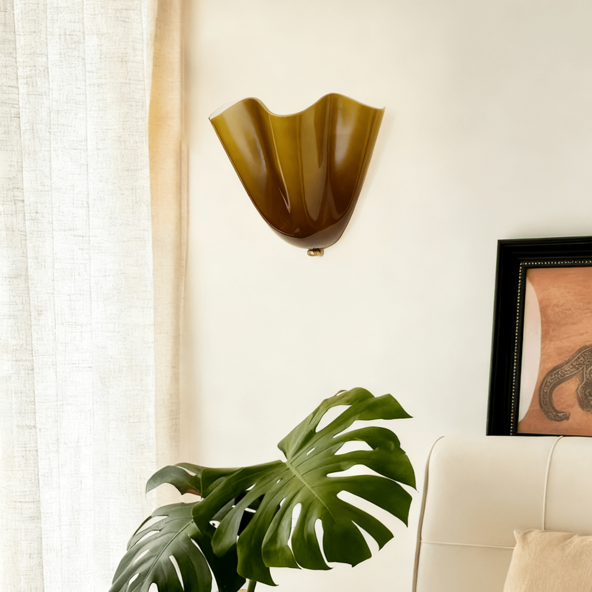 Wall Sconce with Wavy Glass Shade and Warm Ambient Lighting